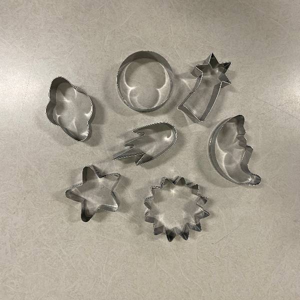 7 cookie cutters in various space shapes